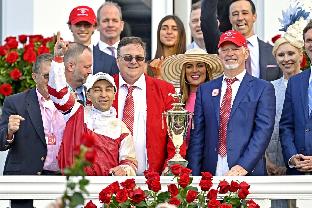 Owner Rick Dawson (right of trophy) joined forces with Eric Reed (left) in 2021. 